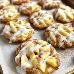 To make these tasty baked apple fritters, gather these precise ingredients: - 2 large apples (Granny Smith or Honeycrisp), peeled and diced - 2 cups all-purpose flour - 1/2 cup granulated sugar - 2 teaspoons baking powder - 1 teaspoon cinnamon - 1/4 teaspoon nutmeg - 1/2 teaspoon salt - 3/4 cup buttermilk - 1/4 cup unsalted butter, melted - 1 large egg - 1 teaspoon vanilla extract - 1 cup powdered sugar (for glaze) - 2 tablespoons milk (for glaze) - Extra cinnamon for dusting These measurements will yield about 12 delightful fritters. I love using Granny Smith and Honeycrisp apples in this recipe. Granny Smith apples bring a tartness that balances the sweetness. Honeycrisp apples add a juicy crunch and a hint of sweetness. You can mix and match both types to create a flavor blend that suits your taste. For a simple glaze, you need powdered sugar and milk. The glaze adds a sweet finish that pairs well with the fritters. You can also add vanilla extract to the glaze for extra flavor. If you want to get fancy, sprinkle some extra cinnamon on top for a warm touch. Enjoy customizing your fritters! First, gather all your ingredients. You need: - 2 large apples (Granny Smith or Honeycrisp), peeled and diced - 2 cups all-purpose flour - 1/2 cup granulated sugar - 2 teaspoons baking powder - 1 teaspoon cinnamon - 1/4 teaspoon nutmeg - 1/2 teaspoon salt - 3/4 cup buttermilk - 1/4 cup unsalted butter, melted - 1 large egg - 1 teaspoon vanilla extract - 1 cup powdered sugar (for glaze) - 2 tablespoons milk (for glaze) - Extra cinnamon for dusting Make sure your apples are fresh. This will add great flavor to the fritters. In a large bowl, whisk together the dry ingredients. Mix the flour, sugar, baking powder, cinnamon, nutmeg, and salt. This step is key. It helps blend the flavors. In another bowl, mix the wet ingredients. Combine the buttermilk, melted butter, egg, and vanilla extract. Stir until the mix is smooth. Now, pour the wet mix into the dry mix. Stir gently until just combined. Do not overmix. Then, fold in the diced apples. This adds that tasty apple bite! Preheat your oven to 375°F (190°C). Line a baking sheet with parchment paper. This keeps the fritters from sticking. Use a spoon or small ice cream scoop. Drop the batter onto the baking sheet. Shape them into fritters, spacing them about 2 inches apart. Bake for 15-20 minutes. Check for a golden brown color. Insert a toothpick into a fritter. If it comes out clean, they are ready. Baking times can vary. If you live at a higher altitude, check them a bit earlier. If they look soft or pale, leave them in longer. Always trust your eyes and toothpick! Soggy fritters can ruin your treat. To avoid this, make sure to drain any excess moisture from the apples before mixing them in. Use a paper towel to dab them dry. Also, do not overmix the batter. Gentle folding helps keep air in the mix and makes fritters light. Accurate measuring helps achieve perfect fritters. Use dry measuring cups for flour and sugar. Spoon the flour into the cup, then level it off with a knife. For liquids, use a clear measuring cup. Fill it to the mark for the right amount. Weighing ingredients can also help if you have a kitchen scale. If your fritters are too dense, you may have added too much flour. Next time, check your measurements. If they are not sweet enough, increase the sugar by a tablespoon. For undercooked centers, bake a few extra minutes. Keep an eye on them to avoid overbaking. For more tips, check the Full Recipe. {{image_2}} You can make your apple fritters more exciting by adding nuts or dried fruit. Walnuts or pecans add a nice crunch. If you prefer dried fruit, raisins or cranberries work well too. Just fold these extras into your batter with the apples. This gives each bite a different taste and texture. You can change the flavor of your batter easily. Try adding a splash of almond extract for a nutty taste. You can also mix in some lemon zest for a bright note. For a spicier kick, add a bit of ginger or allspice. These flavors give your fritters a unique twist while keeping them delicious. The glaze is a key part of your fritters. Instead of the basic glaze, try melting chocolate for a rich topping. You could also sprinkle some crushed nuts on top for added texture. If you like a fruity finish, drizzle some caramel or maple syrup over the fritters. These options let you customize your fritters to fit any mood or occasion. For the full recipe, check out the Homemade Baked Apple Fritters section. After you enjoy your apple fritters, you may have some left. To store them, place the fritters in an airtight container. Make sure they cool completely before sealing. This keeps them soft and fresh. Store them at room temperature for up to two days. For longer storage, keep them in the fridge for up to a week. When you are ready to eat your fritters again, reheating them is key. Place fritters in the oven at 350°F (175°C) for about 5-10 minutes. This warms them and keeps them crisp. You can also use a microwave. Heat them for about 15-20 seconds. However, this may make them a bit soft. If you want to keep fritters longer, freezing is a great option. First, let them cool completely. Then, place them in a single layer on a baking sheet. Freeze them for about an hour. After that, transfer the fritters to a freezer-safe bag. They will stay fresh for up to three months. When ready to enjoy, just thaw them in the fridge and reheat. For the full recipe of these delicious fritters, check the earlier section. Yes, you can use gluten-free flour. Just swap the all-purpose flour for a gluten-free blend. Make sure it has a good binding agent, like xanthan gum. This helps the fritters hold their shape. The texture may differ, but they will still taste great. Check the fritters at 15 minutes. They should be golden brown. Use a toothpick to test them. If it comes out clean, they are ready. If you see wet batter, bake them a little longer. Keep an eye on them to avoid overbaking. Yes, you can make them ahead. Bake the fritters and let them cool. Store them in an airtight container. They will stay fresh for two days. You can also freeze them. Just wrap each fritter in plastic wrap and place them in a freezer bag. - How to keep them fresh: To keep baked fritters fresh, store them at room temperature. If they get a bit dry, you can warm them in the oven for a few minutes. This helps restore their softness. You can also drizzle on some fresh glaze to enhance flavor. Enjoy your delicious apple fritters any time! This blog post guides you through making baked apple fritters. You learned about the right ingredients, measurements, and types of apples. We also covered a step-by-step process for baking, tips to avoid soggy fritters, and ideas for variations. Now, you can customize your fritters with nuts or glazes. Remember to store any leftovers properly to keep them fresh. Enjoy making your apple fritters, and don’t hesitate to experiment. The more you try, the better they will get!