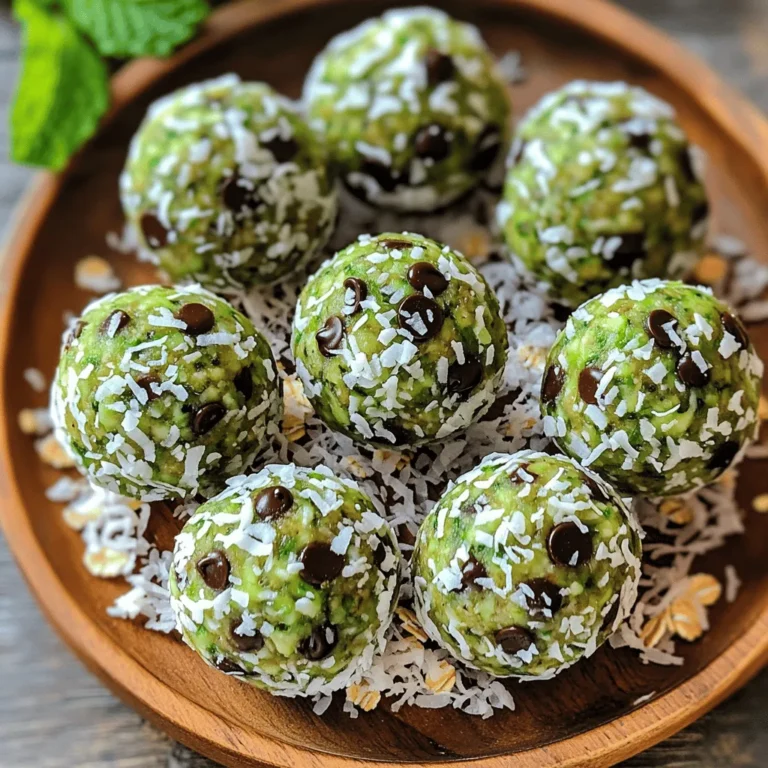 - 1 cup rolled oats - 1/2 cup almond butter - 1/3 cup honey or maple syrup - 1/4 cup chocolate protein powder - 1/4 cup mini dark chocolate chips - 1 teaspoon peppermint extract - 1/4 teaspoon sea salt - 2 tablespoons chia seeds (optional) - 1/4 cup shredded coconut (optional) Each ingredient plays a key role in making these protein balls tasty and healthy. Rolled oats provide fiber and help keep you full. They give a nice texture. Almond butter adds healthy fats and protein. It also makes the balls creamy. You can swap it for peanut butter if you prefer. Honey or maple syrup acts as a sweetener. It binds the ingredients together, making the mixture easy to roll into balls. Chocolate protein powder boosts protein and adds rich flavor. Look for a brand you enjoy. Mini dark chocolate chips add a sweet touch. They melt in your mouth and make every bite fun. Peppermint extract gives that fresh mint flavor. It reminds you of mint chocolate chip ice cream! Sea salt balances the sweetness. Just a pinch goes a long way. Chia seeds are optional but great for added nutrition. They provide fiber and omega-3 fatty acids. Shredded coconut adds a chewy texture and sweetness. It’s also optional but delicious. - Each protein ball has around 100 calories. - They contain about 4 grams of protein, 5 grams of fat, and 10 grams of carbs. These protein balls are a smart snack. They are easy to make and great for energy. Here’s why each ingredient is good for you: - Oats help with digestion. They can keep your heart healthy. - Almond butter is rich in vitamin E and magnesium. It supports your skin and muscles. - Honey and maple syrup provide natural sugars, giving you quick energy. - Chocolate protein powder helps build and repair muscles. - Dark chocolate is full of antioxidants. It can improve heart health. - Peppermint can aid digestion and refresh your breath. - Chia seeds are a superfood. They help with hydration and provide energy. - Coconut can boost your immune system and is full of fiber. These balls are not just tasty; they are filled with good stuff! 1. Start with mixing the dry ingredients. In a large bowl, add: - 1 cup rolled oats - 1/4 cup chocolate protein powder - 1/4 teaspoon sea salt Stir these well until they are evenly mixed. 2. Next, combine the wet ingredients. In a separate bowl, mix: - 1/2 cup almond butter - 1/3 cup honey or maple syrup - 1 teaspoon peppermint extract Blend these until smooth and well combined. 3. Now, incorporate the mixtures. Pour the wet mix into the dry mix. Stir until everything is well combined. 1. Use your hands to roll the mixture into small balls. Aim for the size of a tablespoon. 2. If you want to add texture, roll the balls in shredded coconut. This step is optional but tasty! 1. Place the protein balls on a parchment-lined sheet. Put them in the refrigerator for about 30 minutes. This helps them firm up nicely. 2. For storage, keep the balls in an airtight container. They will stay fresh in the fridge for up to a week. To get the right texture for your Mint Chocolate Chip Protein Balls, you may need to adjust the mixture. If it feels sticky, add a little more protein powder or rolled oats. This helps absorb excess moisture. On the other hand, if the mixture is dry, add a teaspoon of almond butter at a time. This will help bind it better. When mixing, combine the dry ingredients first. This helps evenly distribute the protein powder and salt. Then, mix the wet ingredients separately. Pour them into the dry mix for a smooth blend. To keep your protein balls fresh, store them in an airtight container. They last about a week in the fridge. You can also freeze them for later. Just place the balls on a baking sheet first. Freeze until solid, then transfer them to a freezer-safe bag. They can stay good for up to three months. These protein balls make a great snack on their own, but they pair well with fruits or yogurt. You can also enjoy them with a smoothie or a glass of milk. If you have dietary needs, feel free to swap the almond butter for sunflower seed butter for nut-free options. You can also use agave syrup instead of honey for vegan diets. {{image_2}} You can play with flavors in your protein balls. Adding a splash of vanilla or almond extract gives a nice twist. These extracts mix well with the mint flavor. You can also try different types of chocolate. Dark chocolate, white chocolate, or even carob can change the taste. Each option makes the protein balls special. If you don't have almond butter, use peanut butter or sunflower seed butter. These swaps keep your balls tasty. For sweeteners, you can use agave syrup or stevia instead of honey. Each sweetener brings a unique flavor. Try what you have on hand for a fun twist. Want to boost nutrition? Add superfoods like protein powder or spirulina. These ingredients make your protein balls extra healthy. You can also customize for your diet. If you're vegan, use a plant-based protein powder. For gluten-free options, make sure your oats are certified gluten-free. These adjustments help meet your dietary needs while keeping the taste delicious. You can find pre-made mint chocolate chip protein balls at many grocery stores. Popular brands include Quest, RXBAR, and Oatmega. These brands offer tasty options that make snacking easy. If you prefer shopping online, websites like Amazon, Thrive Market, and iHerb have a wide selection. You can browse different brands and flavors right from your home. When comparing homemade and store-bought protein balls, cost is important. Making them at home is usually cheaper. You can buy ingredients in bulk for better savings. Store-bought options often have added sugars or preservatives. Homemade protein balls let you control what goes in. This means you can avoid unwanted additives and choose healthier options. When picking store-bought protein balls, always read the labels. Check for natural ingredients and good protein sources. Look for options with minimal added sugar. A quality protein ball should have whole foods as its main ingredients. Aim for products that list protein as the first ingredient. This way, you know you are getting a good snack. Mint Chocolate Chip Protein Balls can last up to a week in the fridge. Store them in an airtight container to keep them fresh. If they change color or smell sour, it’s time to toss them. Yes, you can use different protein powders. Each type may change the taste and texture. For instance, vanilla protein powder may add sweetness. Plant-based powders might alter consistency a bit. Just ensure they mix well. Absolutely! These protein balls offer great nutrition for kids. They contain oats, which provide energy. Almond butter adds healthy fats, while honey boosts sweetness naturally. For kids, try these fun variations: - Roll them in colorful sprinkles for a treat. - Swap mini chocolate chips for dried fruit for a fruity twist. This blog post shared a tasty recipe for Mint Chocolate Chip Protein Balls. We covered ingredients, step-by-step instructions, and useful tips. You learned about making these snacks healthier and how to store them. These protein balls are easy to adapt for different tastes and diets. You can enjoy them as a quick treat or a healthy snack. Try making them yourself, and feel proud of your creation! Enjoy the balance of flavor, nutrition, and fun in every bite.
